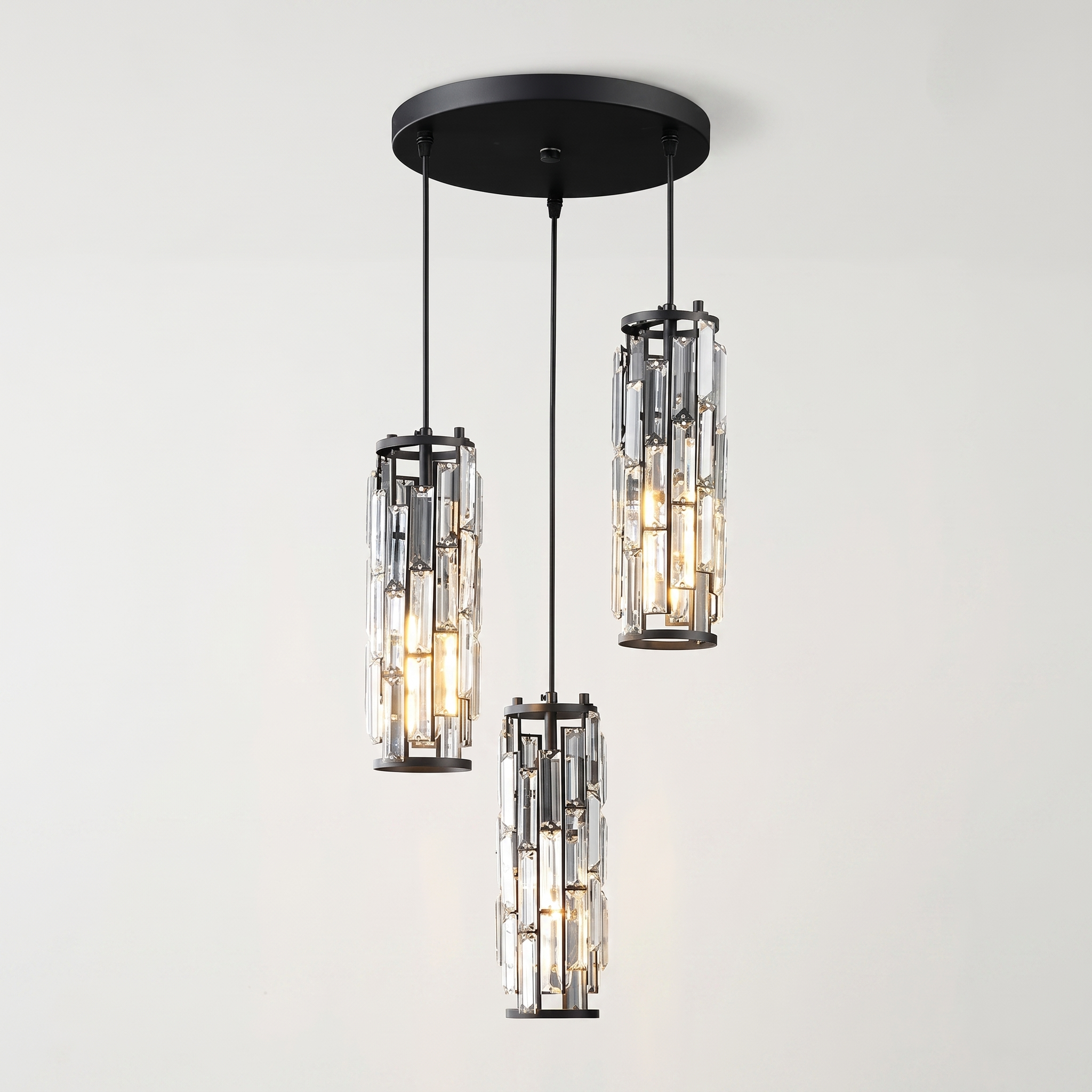 Black Aurelique three-light crystal pendant studio shot