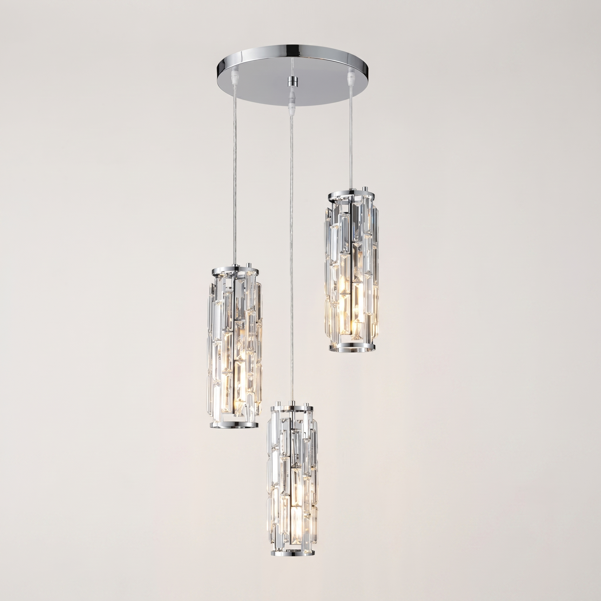 Chrome Aurelique three-light crystal pendant studio shot