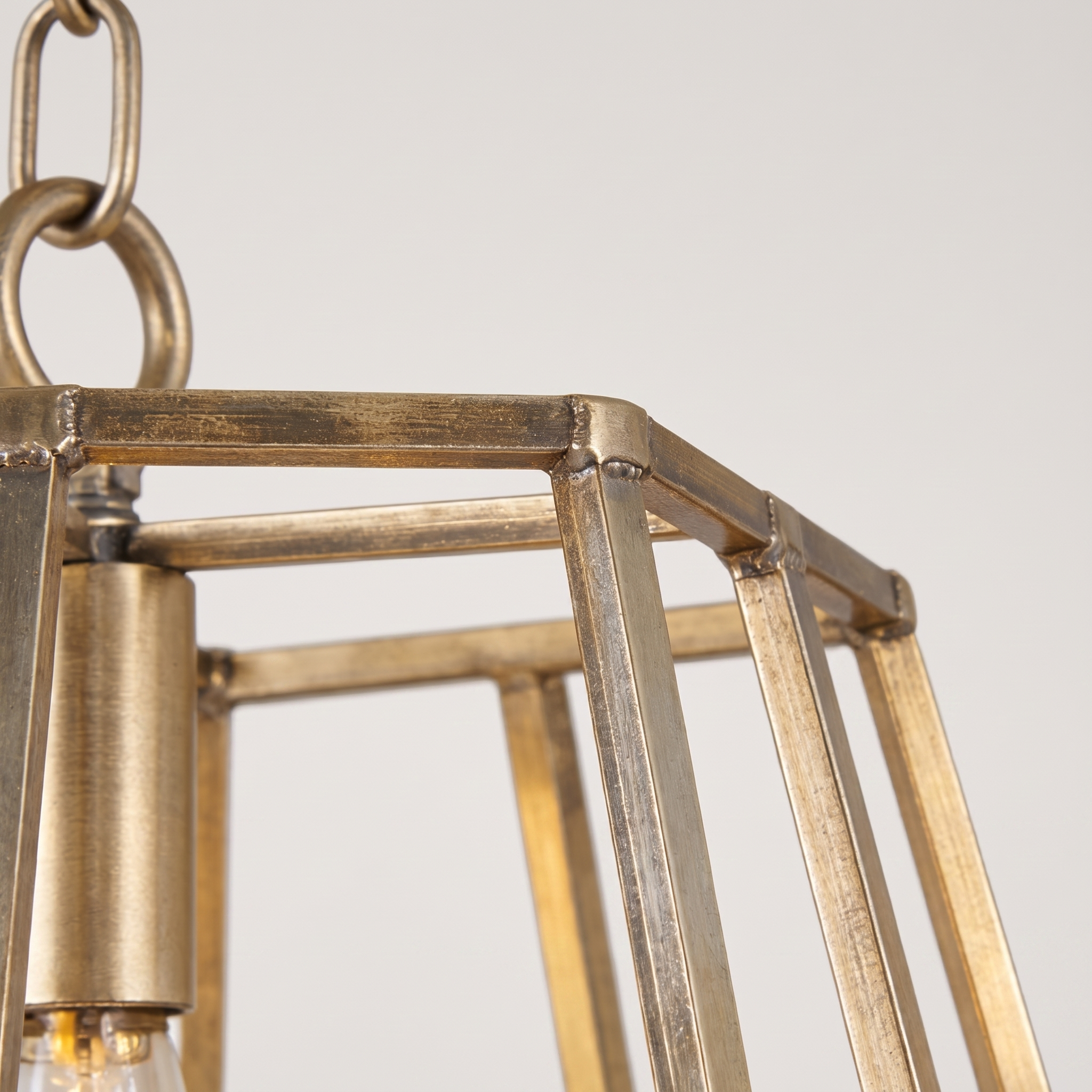 Corvale gold geometric frame pendant with cylindrical bulb holder