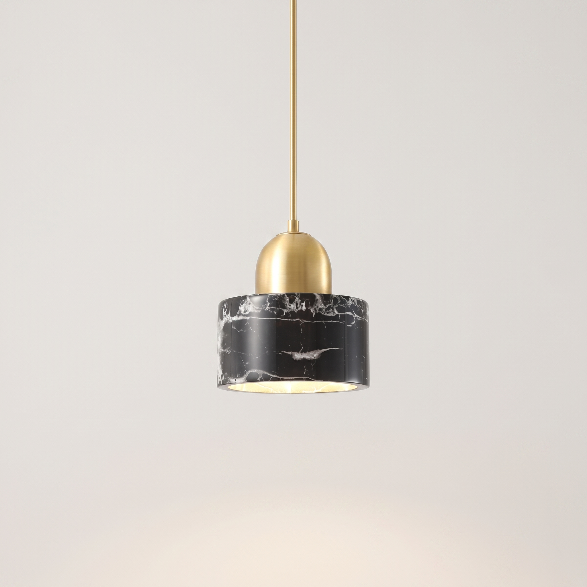 Marbelle pendant light over a marble kitchen island