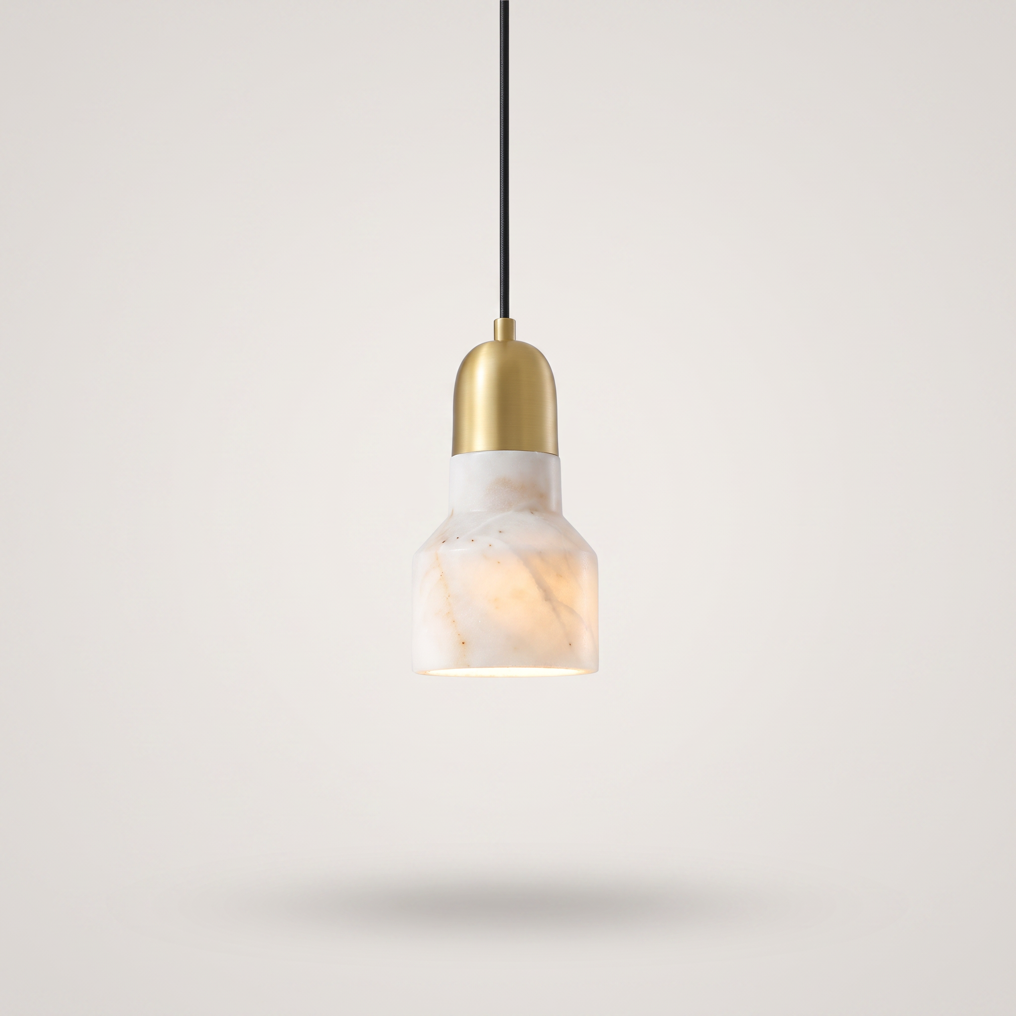 Marbelle marble drum pendant light in a luxury living room