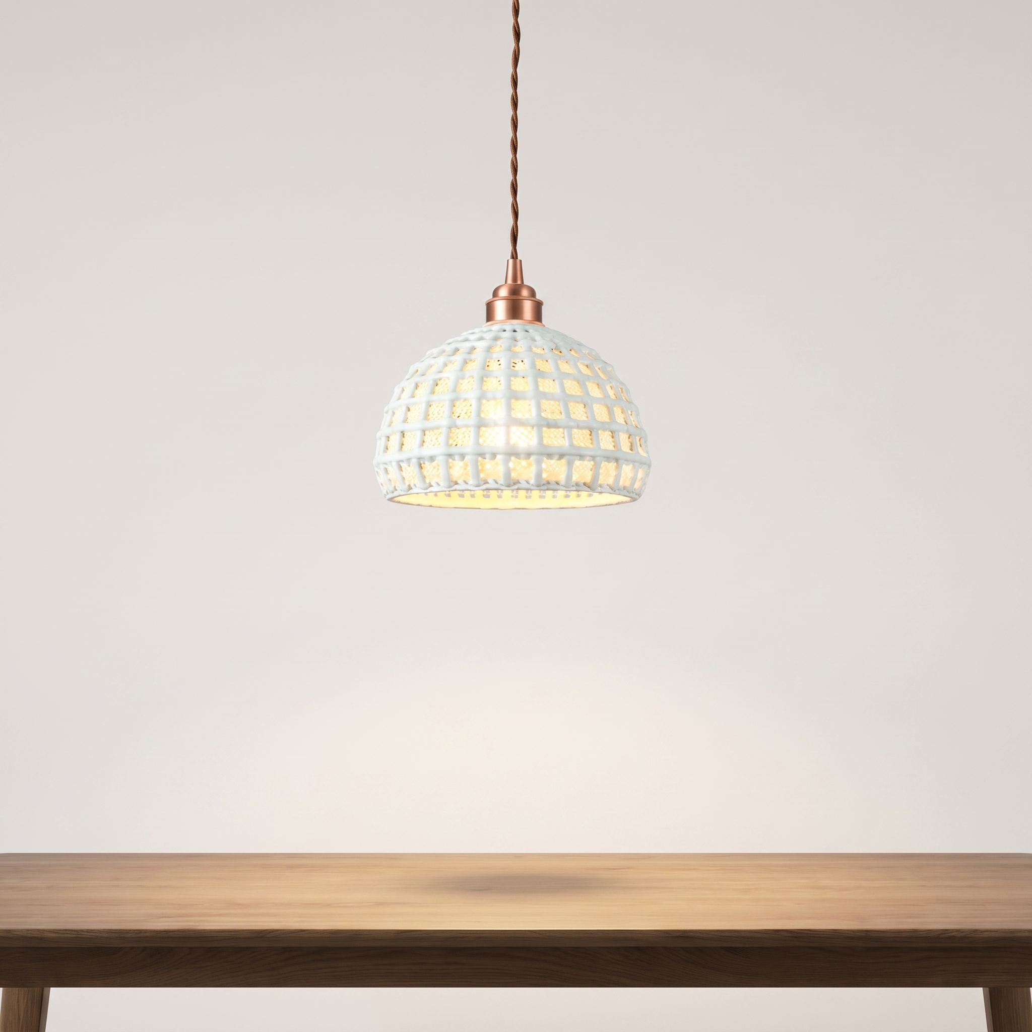Ceralume ceramic semi-globe pendant light in a luxury dining room