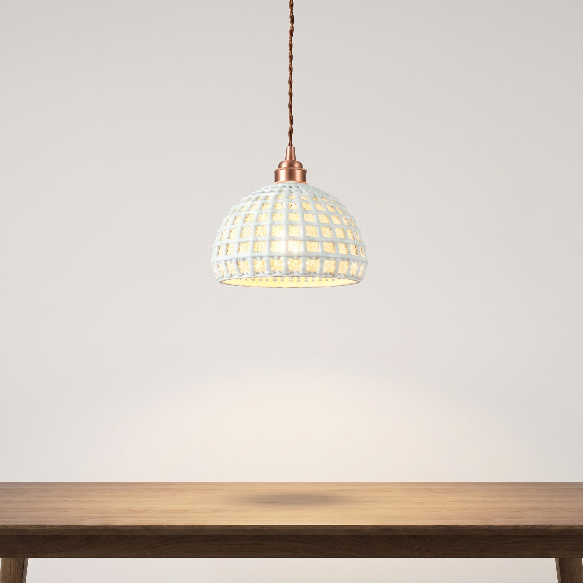 Ceralume ceramic semi-globe pendant light in a luxury dining room