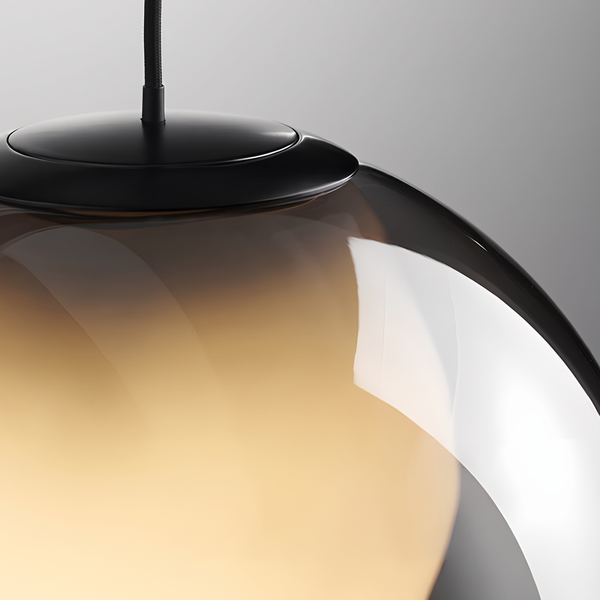 Detail of the Bublora smoked glass and matte black hardware