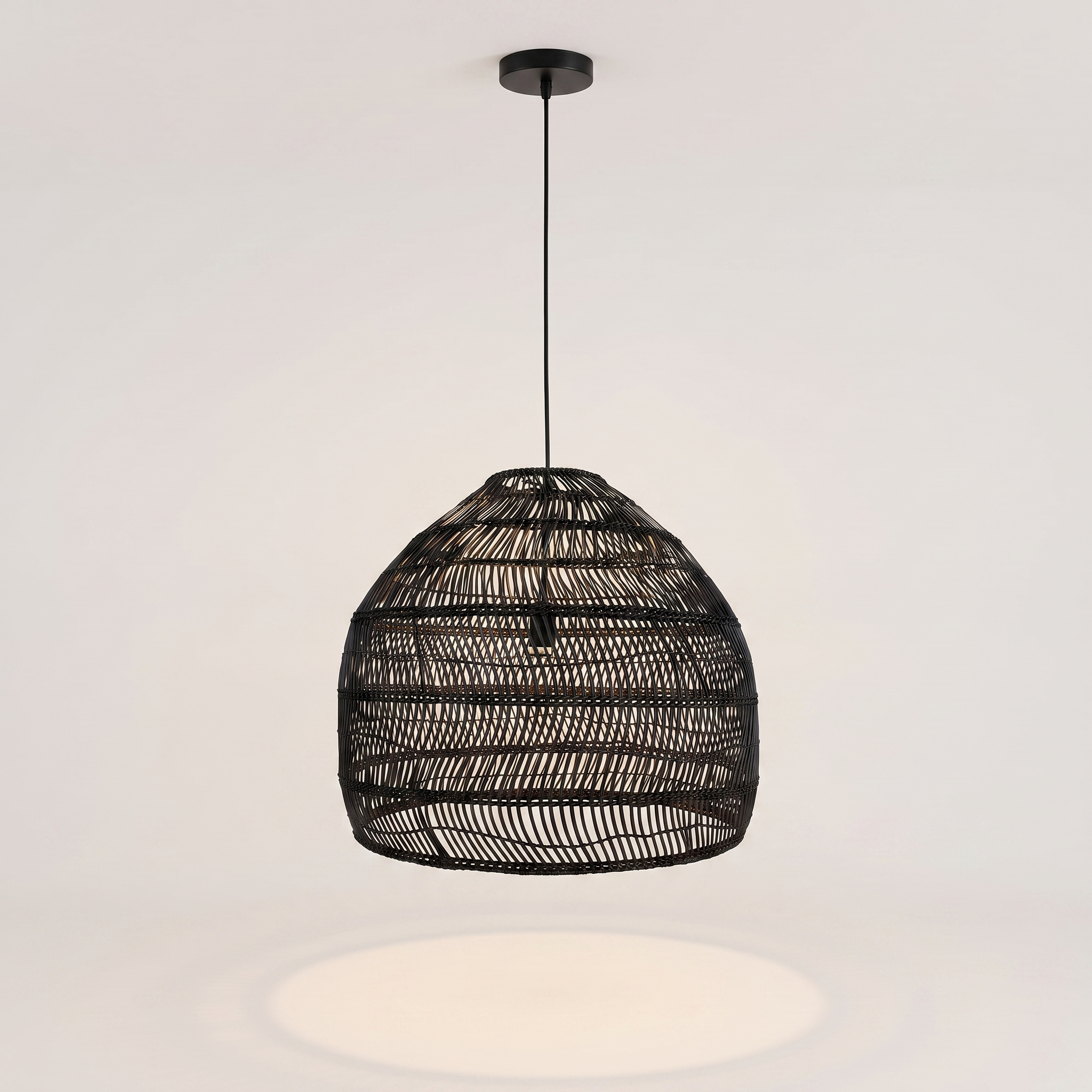 Ratella rattan woven dome pendant light in a luxury bedroom