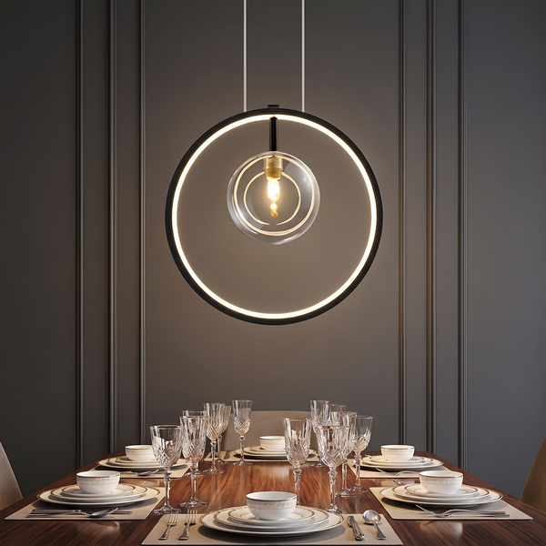 Anelara vertical ring bubble glass pendant above a dining table